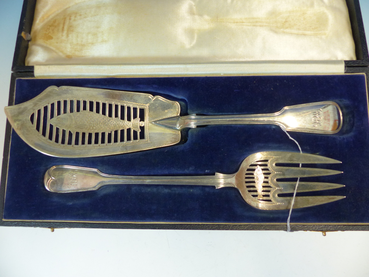 TWO VICTORIAN HALLMARKED SILVER FISH SERVERS CASED TOGETHER DATED 1872- AND 1887. WEIGHT 343grms.