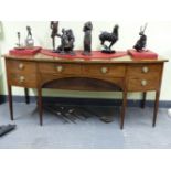 A GEORGE III MAHOGANY SIDEBOARD, THE BOW FRONT CROSS BANDED IN ROSEWOOD ABOVE TWO CENTRAL DRAWERS