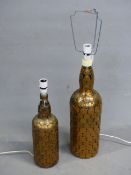 TWO BOTTLE TABLE LAMPS MOUNTED WITH OLD PENNIES, HALFPENNIES AND 3D BITS. H 48 AND 38cms.