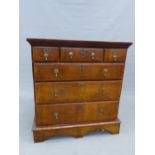 AN 18th.C. AND LATER WALNUT CHEST OF THREE SHORT AND THREE LONG GRADUATED DRAWERS ON SHAPED PLINTH