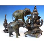 A SRI LANKHAN BRONZE FIGURE OF THE FOUR ARMED GANESH SEATED. H 34cms. A PAIR OF BRONZE ELEPHANT