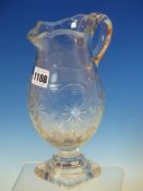 A LATE 18th/EARLY 19th C. BALUSTER CUT GLASS JUG, POSSIBLY IRISH, THE MOULDED OCTAGONAL SOCLE ON A