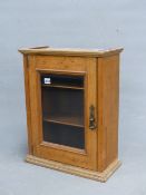 A SMALL GLAZED OAK WALL CABINET. 42 x 54 x 20cms.