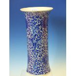 A CHINESE BLUE AND WHITE SLEEVE VASE WITH FLARED RIM, PAINTED WITH SCROLLING LOTUS. H 30cms.