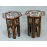 AN ISLAMIC HEXAGONAL TABLE, THE BANDS OF GEOMETRIC INLAY TO THE TOP ENCLOSING A ROUNDEL OF EBONY