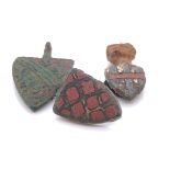 TWO MEDIAEVAL BRONZE SHIELD SHAPED ARMORIAL PENDANTS TOGETHER WITH A MOUNT, TWO WITH RED ENAMELLING,