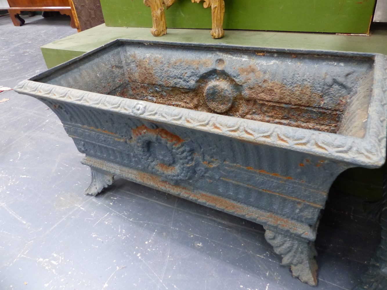 A HARLEQUIN SET OF SIX ANTIQUE IRON PLANTERS, THE RECTANGULAR RIMS OVER FLUTED BANDS AND CENTRAL - Image 6 of 11
