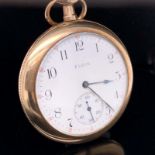 A GOLD PLATED ELGIN OPEN FACE POCKET WATCH. DIAMETER 38mm. GROSS WEIGHT 68.4grms.