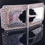 A PERSIAN NIELLO FINE SILVER BELT BUCKLE, LENGTH 9cms X 4.2cms, WEIGHT 73.1grms.