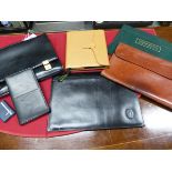 A DUNHILL BLACK LEATHER BRIEF CASE, A CARRIER BLACK LEATHER NOTE AND CARD CASE, A SMYTHSON TAN