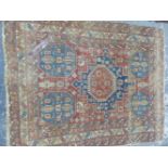 AN ANTIQUE CAUCASIAN RUG. 160 x 130cms.