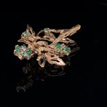 A 9ct GOLD EMERALD AND DIAMOND MULTI CLUSTER BARK FINISH FLORAL BROOCH. MEASUREMENTS 4.2cms X 2.