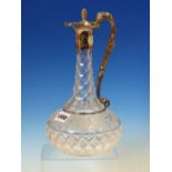 A CUT GLASS GLOBE AND SHAFT CLARET JUG WITH ELECTROPLATE MOUNTS CAST WITH VINES