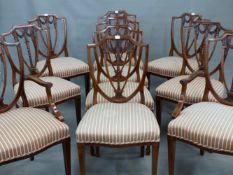 A SET OF TEN HEPPLEWHITE STYLE MAHOGANY SHIELD BACKED CHAIRS INCLUDING TWO WITH ARMS, THE BACK FR