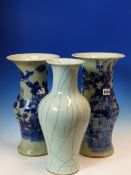 TWO SIMILAR CHINESE CELADON GROUND VASES PAINTED IN BLUE WITH FLOWERS AND FOLIAGE. H 37cms. TOGETHER