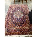 A PAIR OF PERSIAN TABRIZ RUGS. 202 x 132cms (2).