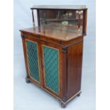 A 19th C. ROSEWOOD SIDE CABINET, THE MIRRORED BACK BELOW A BRASS GALLERIED SHELF, THE DOORS BELOW