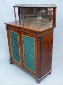 A 19th C. ROSEWOOD SIDE CABINET, THE MIRRORED BACK BELOW A BRASS GALLERIED SHELF, THE DOORS BELOW