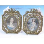 THREE DECORATIVE PORTRAIT MINIATURES OF LADIES, TWO IN EASEL BACKED BRASS FILIGREE FRAMES AND THE
