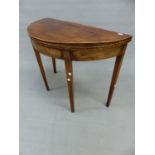 A REGENCY MAHOGANY AND BOXWOOD STRUNG DEMI LUNE FOLD OVER TEA TABLE ON SQUARE TAPERED LEGS. 96cm (