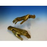 A PAIR OF BRASS GLOVEMAKERS DUMMIES, EACH HAND IN THREE SECTIONS. W 25cms.