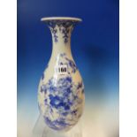 A LATE 19th C. JAPANESE BLUE AND WHITE BALUSTER VASE PAINTED WITH BIRDS AMONGST FLOWERS, PENDANT