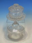 TWO CUT GLASS SWEETMEAT JARS, COVERS AND STANDS, ONE WITH STRAWBERRY CUT DIAMOND DIAPER BANDS, THE