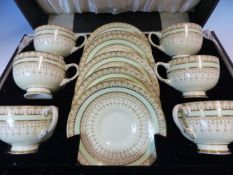 A CASED SET OF SIX PARAGON COFFEE CUPS, SAUCERS AND WHITE METAL SPOONS, THE PORCELAIN WITH TURQUOISE