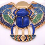 A VINTAGE THOMAS FATTORINI EGYPTIAN REVIVAL GILT METAL AND ENAMEL NECKLET AND MATCHING BANGLE.
