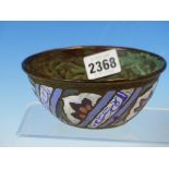 AN EASTERN CHAMPLEVE ENAMELLED COPPER BOWL, THE EXTERIOR WITH SPIRALS OF BLUE SCRIPT ALTERNATING WIT