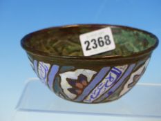 AN EASTERN CHAMPLEVE ENAMELLED COPPER BOWL, THE EXTERIOR WITH SPIRALS OF BLUE SCRIPT ALTERNATING WIT