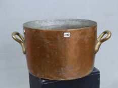 A JULES GAILLARD, PARIS, COPPER CYLINDRICAL CAULDRON WITH BRASS HANDLES AND BRAZED SEAM. Dia. 46.5 x