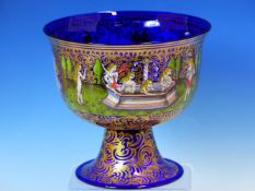 A MURANO BLUE GLASS CUP GILT AND PAINTED IN RENAISSANCE STYLE WITH ROUNDELS OF A BRIDE AND GROOM