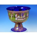 A MURANO BLUE GLASS CUP GILT AND PAINTED IN RENAISSANCE STYLE WITH ROUNDELS OF A BRIDE AND GROOM