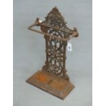 A 19th C. CAST IRON STICK STAND, THE TREFOIL CRESTING OVER A FIGURE OF EIGHT FOLIATE BACK AN