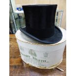 A VINTAGE HENRY HEATH BLACK SILK PILE TOP HAT IN GEORGE HOWARD BOX, THE INTERNAL MEASUREMENTS OF THE
