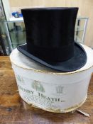 A VINTAGE HENRY HEATH BLACK SILK PILE TOP HAT IN GEORGE HOWARD BOX, THE INTERNAL MEASUREMENTS OF THE