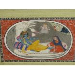 AN INDIAN MINIATURE OF A RECLINING DEITY AND ATTENDANT, WITH OTHER FIGURES IN THE BACKGROUND. 14.5 x