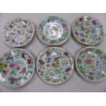 SIX VARIOUS CANTON CELADON GROUND PLATES PAINTED WITH BIRDS, BUTTERFLIES AND FLOWERS. Dia. 26cms.