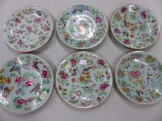 SIX VARIOUS CANTON CELADON GROUND PLATES PAINTED WITH BIRDS, BUTTERFLIES AND FLOWERS. Dia. 26cms.