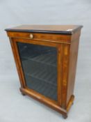A VICTORIAN WALNUT SMALL PIER CABINET WITH SINGLE GLAZED DOOR FLANKED BY INLAID COLUMNS WITH GILT