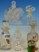 A COLLECTION OF SIX GLASS SCENT BOTTLES, THE TWO BY LALIQUE IN THE FORM OF TWO FLOWER HEADS AND WITH