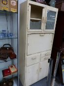 A RETRO KITCHEN CUPBOARD