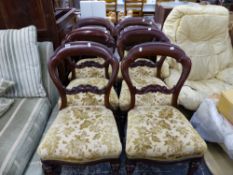 A SET OF SIX MID VICTORIAN MAHOGANY DINING CHAIRS.