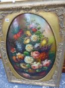 A LARGE DECORATIVE GILT FRAMED PICTURE.