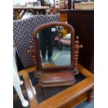 A VICTORIAN SWING MIRROR.