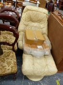 A RETRO LEATHER SWIVEL CHAIR AND STOOL.