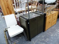 A LEATHER COVERED TWO DOOR CABINET, FOUR RETRO CHAIRS, AND A SIX DRAWER PINE CHEST.