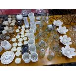 A LARGE COLLECTION OF TEA LIGHT STANDS, CANDLE STANDS, ENAMEL BOXES ETC.