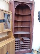 A PAIR OF LARGE MAHOGANY CORNER CABINETS.